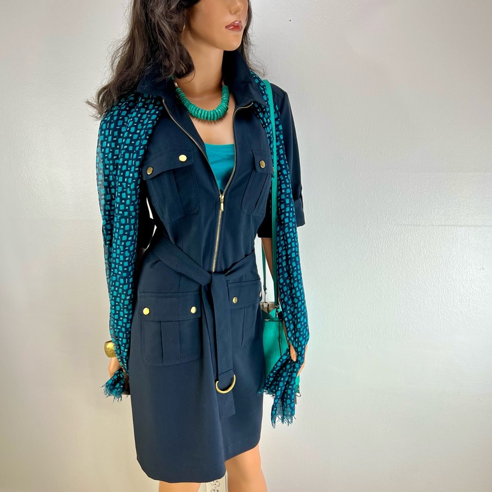 Navy blue dress, for casual wear or work.